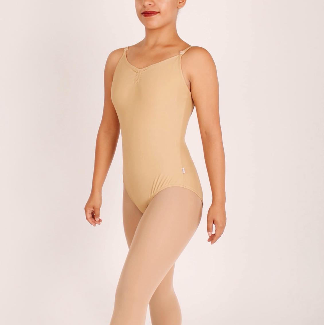 leotardo para danza básico niña con jareta ajustable color beige vista delantera